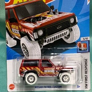 Nissan Patrol Custom First Response Red and White Rescue Vehicle Hot Wheels